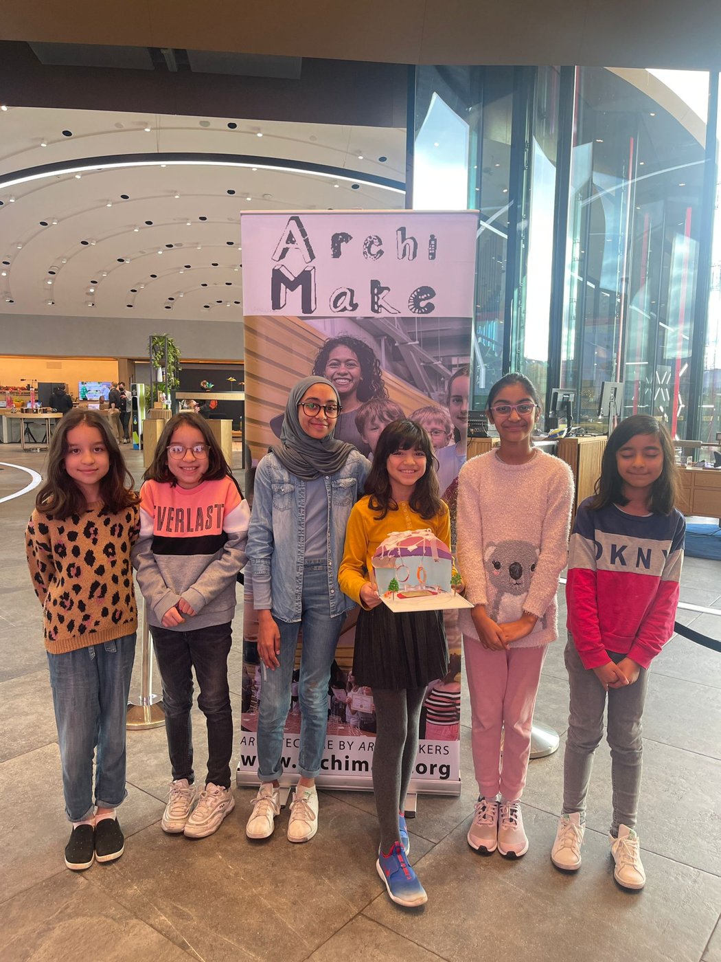 Young Archimakers showing the model they made